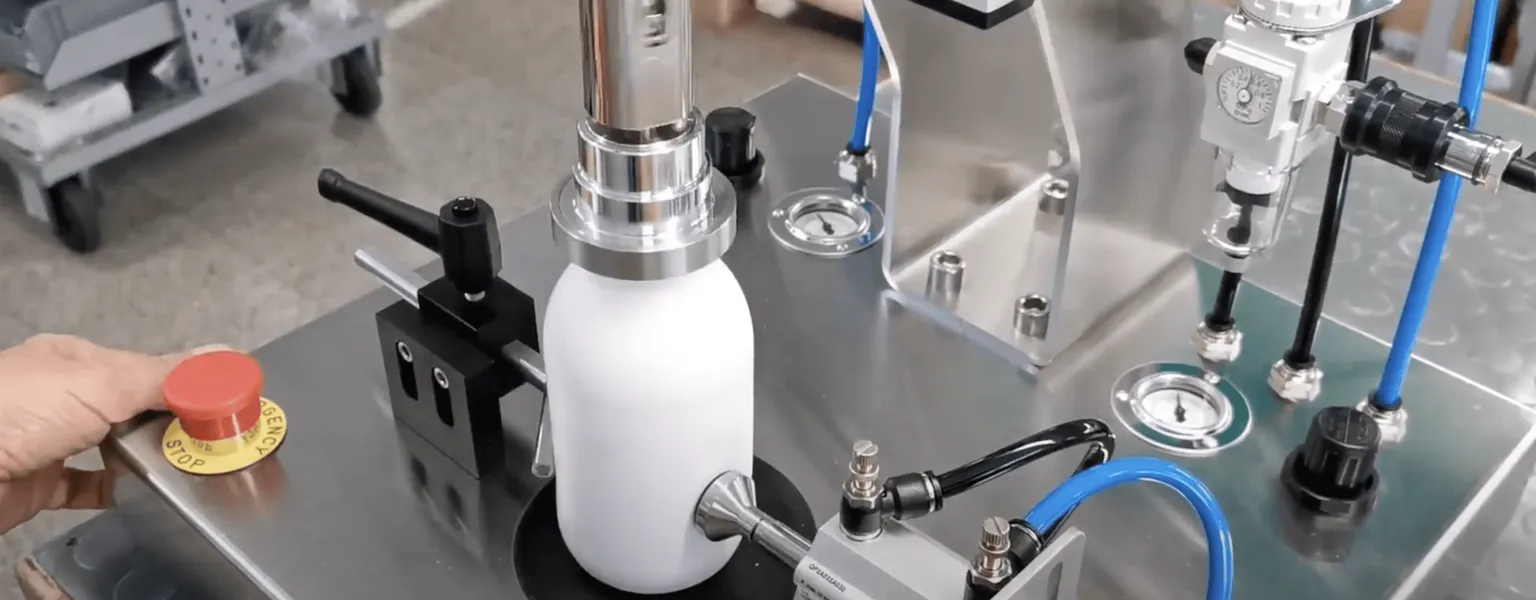 Adelphi Group - Pneumatic Capping Machine