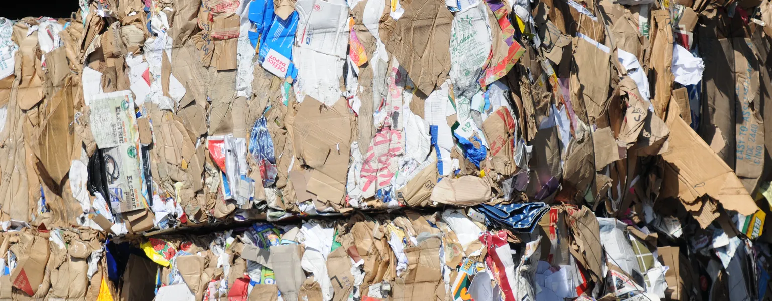 Cube of compressed paper at Berkeley recycling center credit Chiara Coetzee