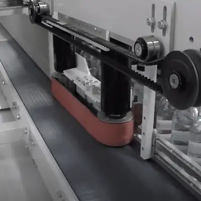 EDL wrap around tray former with single roll wrapper