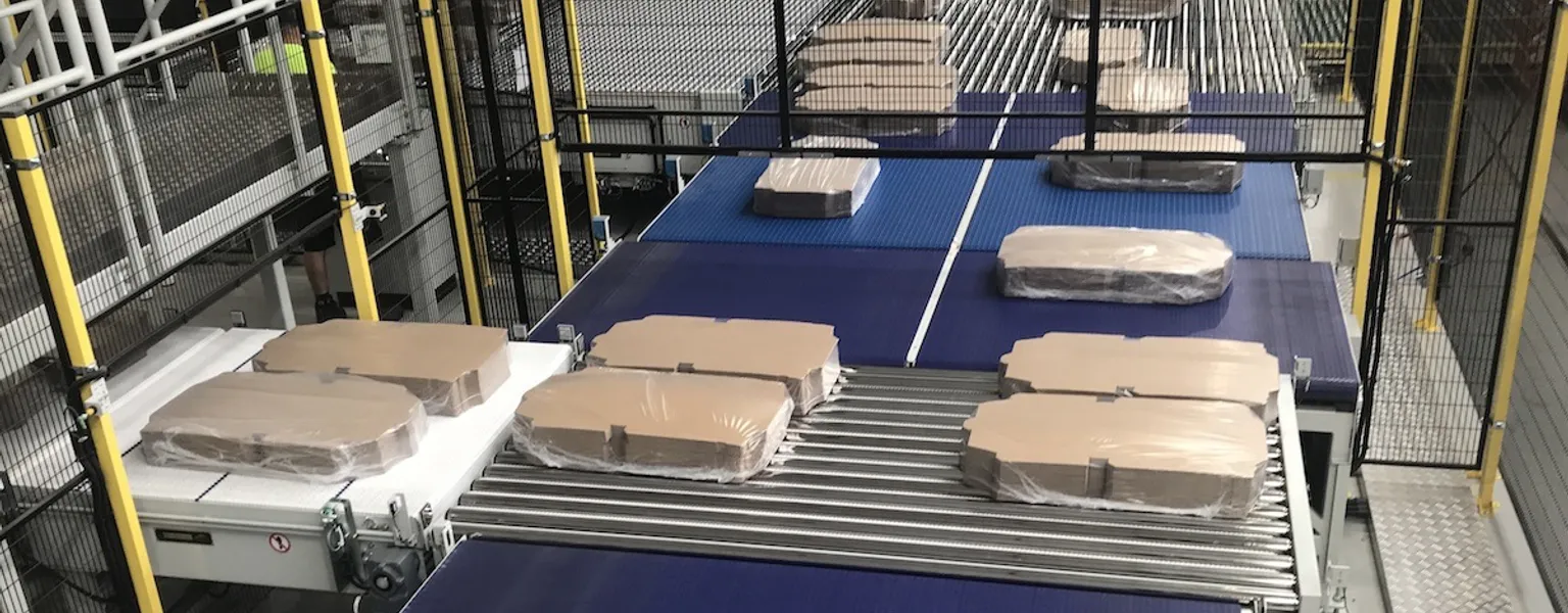YPS Production bottleneck freed up with fast shrink wrap line